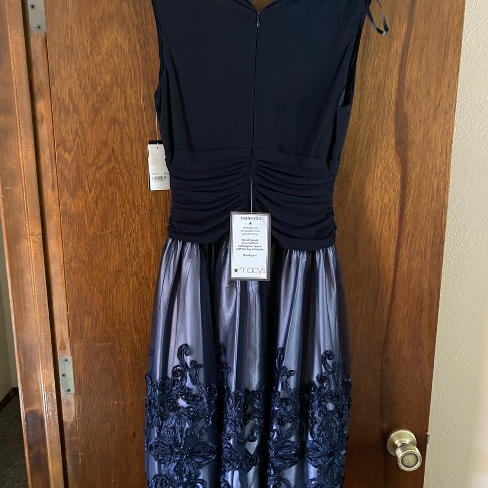 Crisis/Cross top. Navy dress, never worn